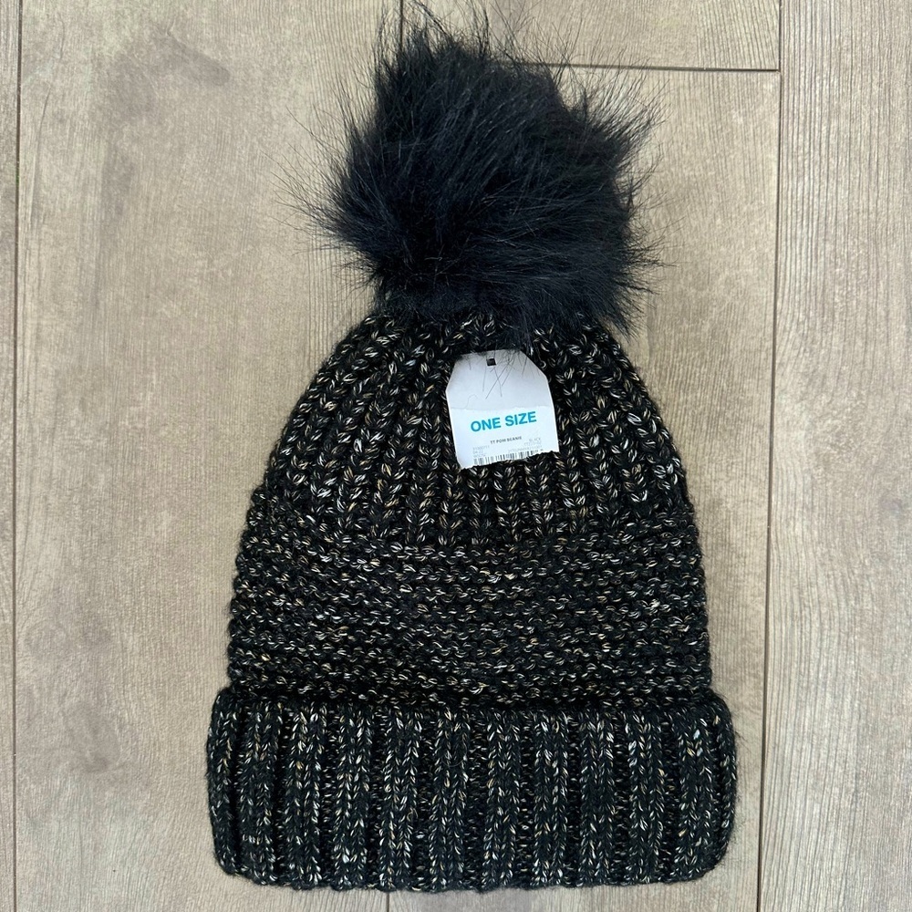 New women’s Pom Pom Black Knit Hat Winter Beanie
New with tags